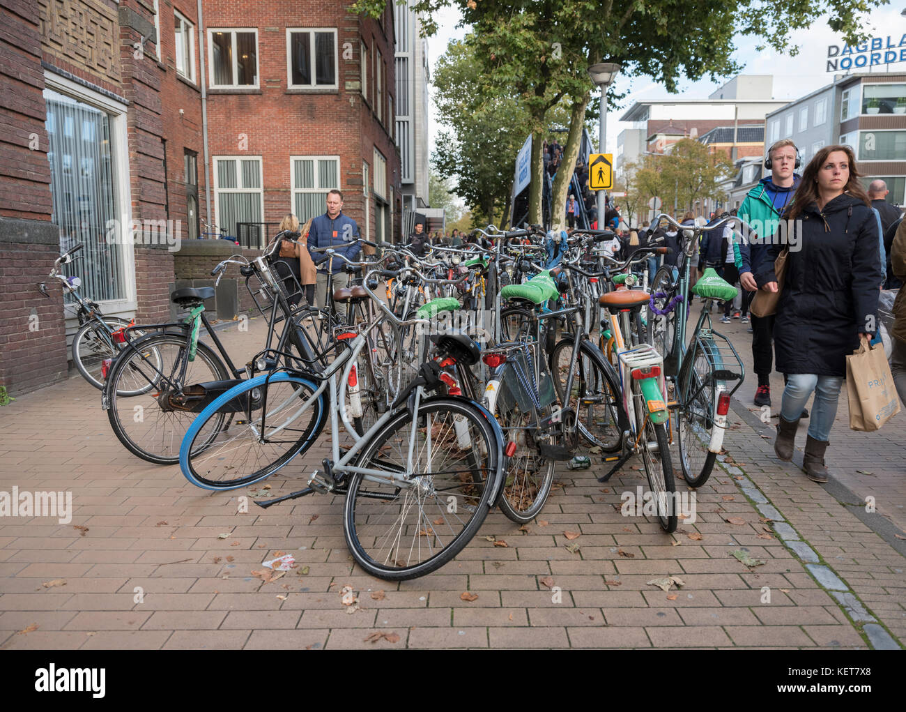 lot of bicycles block pavement of city centre in groningen Stock Photo
