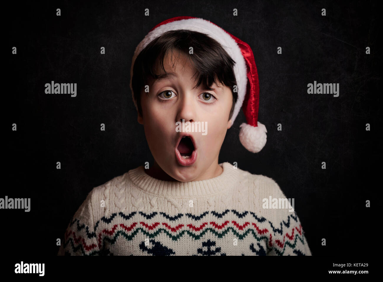 surprised child on christmas Stock Photo