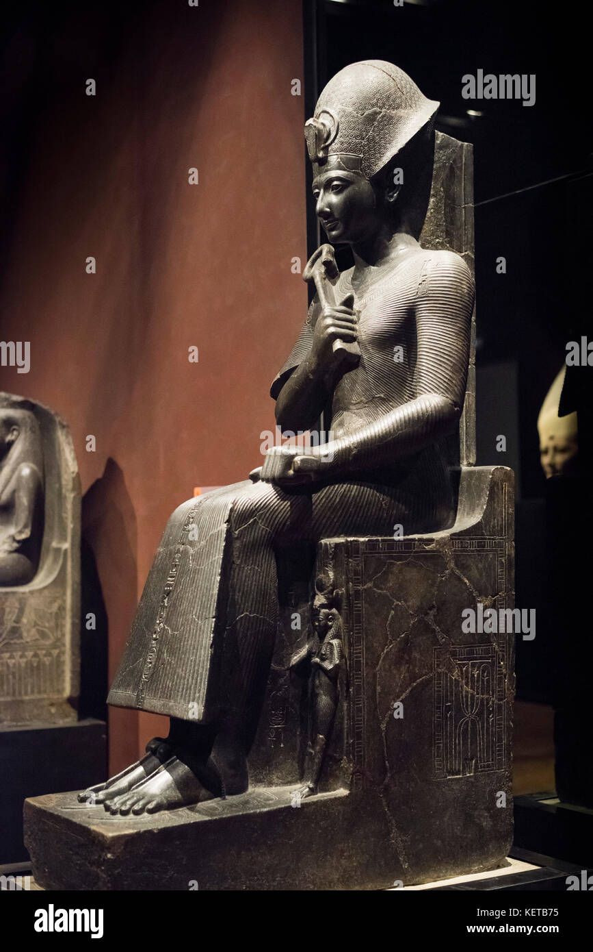 Turin. Italy. Portrait statue of Egyptian Pharaoh Ramesses II wearing a Khepresh crown & holding the Heqa sceptre. Museo Egizio (Egyptian Museum) Stock Photo