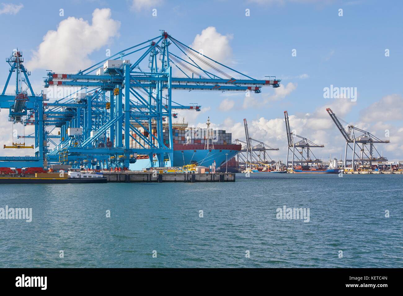 Huge container ship in port Stock Photo