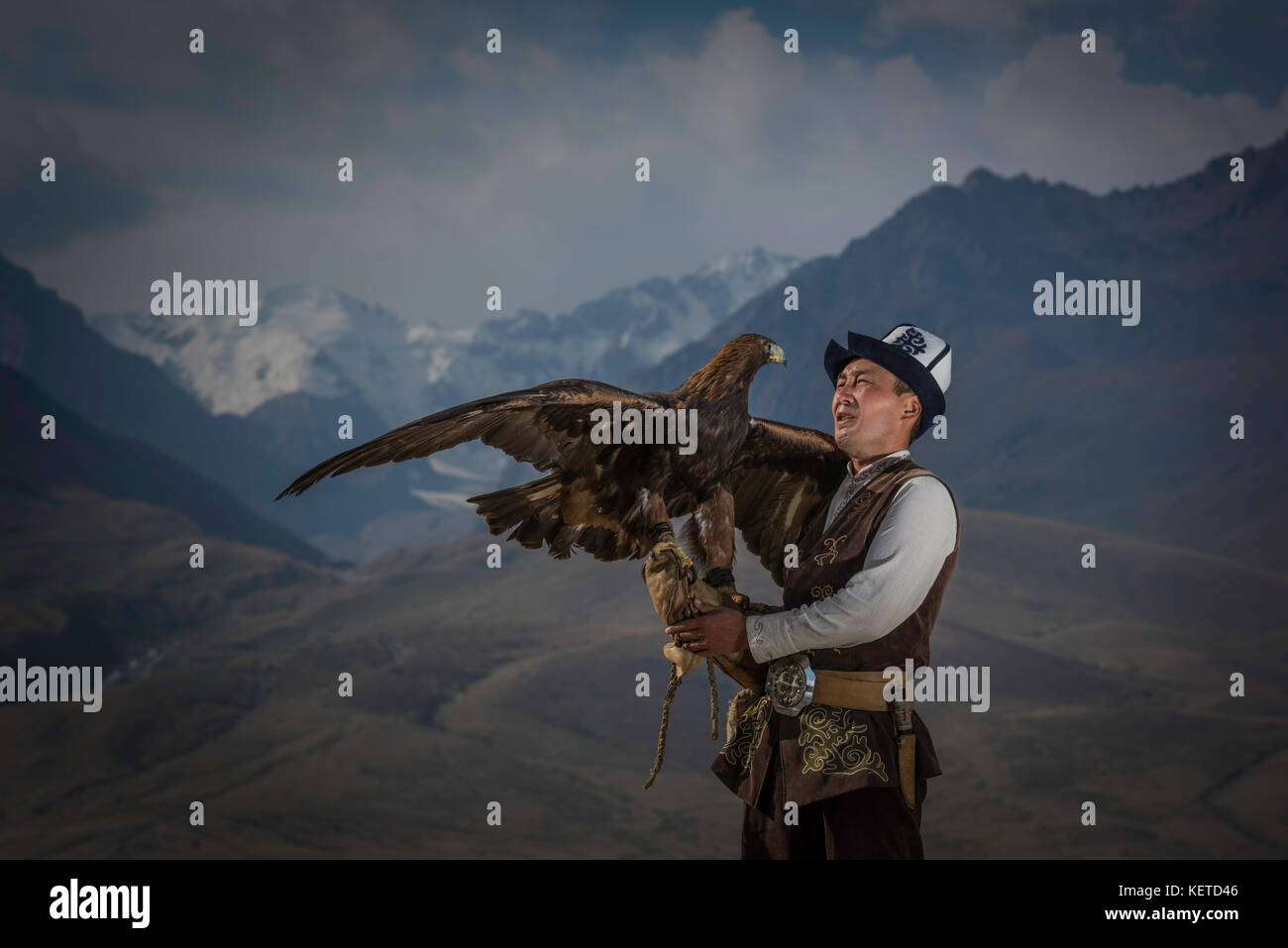 Eagle Hunter in Mountains Stock Photo