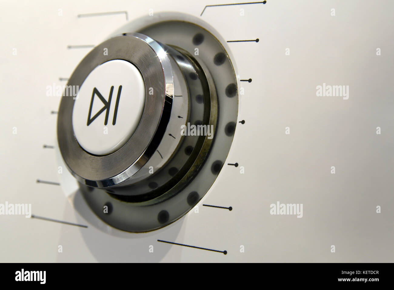 Play and pause power button macro detail Stock Photo - Alamy