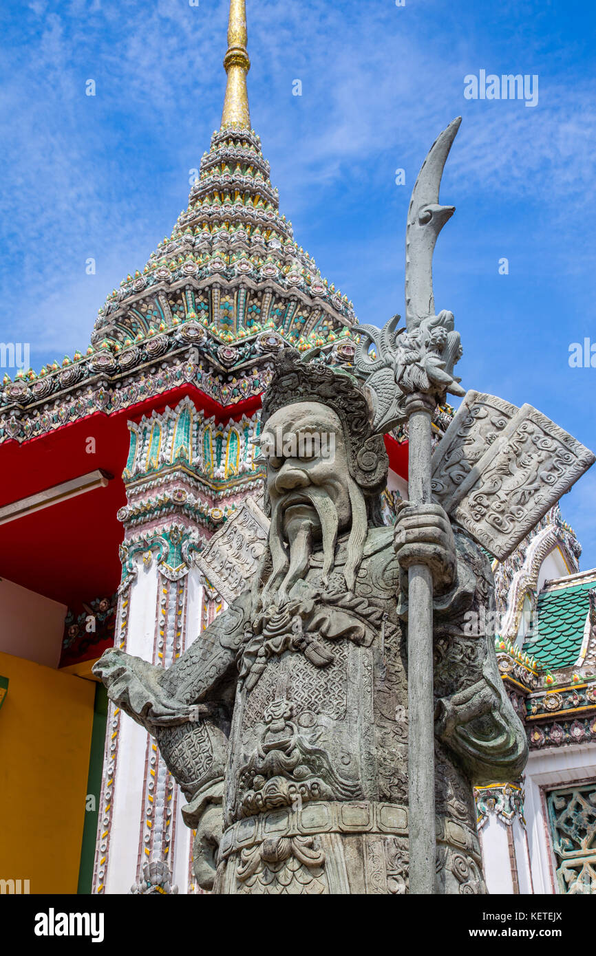 Chinese guardian figure at a gate of Wat Pho, Bangkok, Thailand Stock Photo