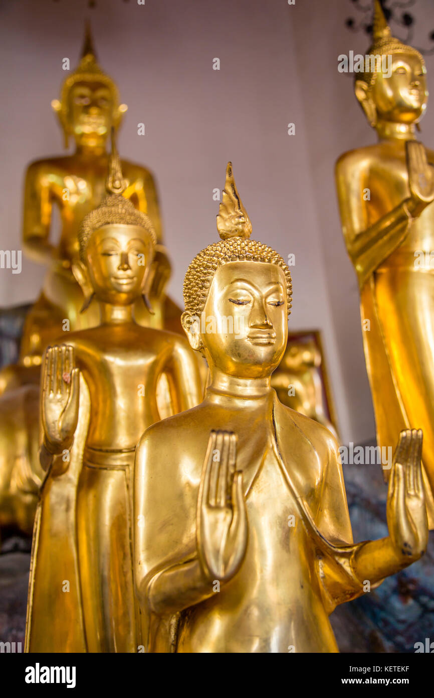 Golden Buddhas at Wat Pho, Bangkok, Thailand Stock Photo