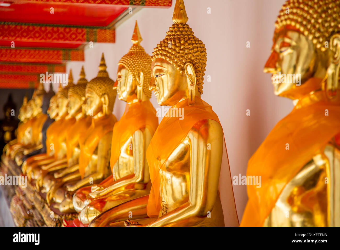 Golden Buddhas at Wat Pho, Bangkok, Thailand Stock Photo
