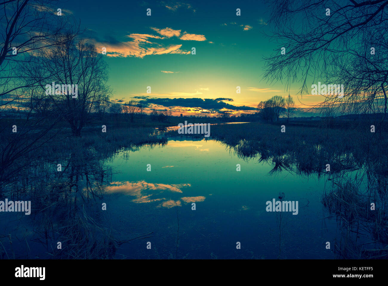 Early in the morning, dawn over the lake. Calm lake before sunrise. A ...