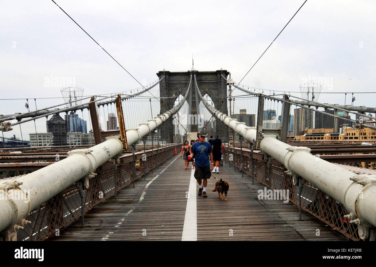 Man walking suspension bridge hi-res stock photography and images - Alamy