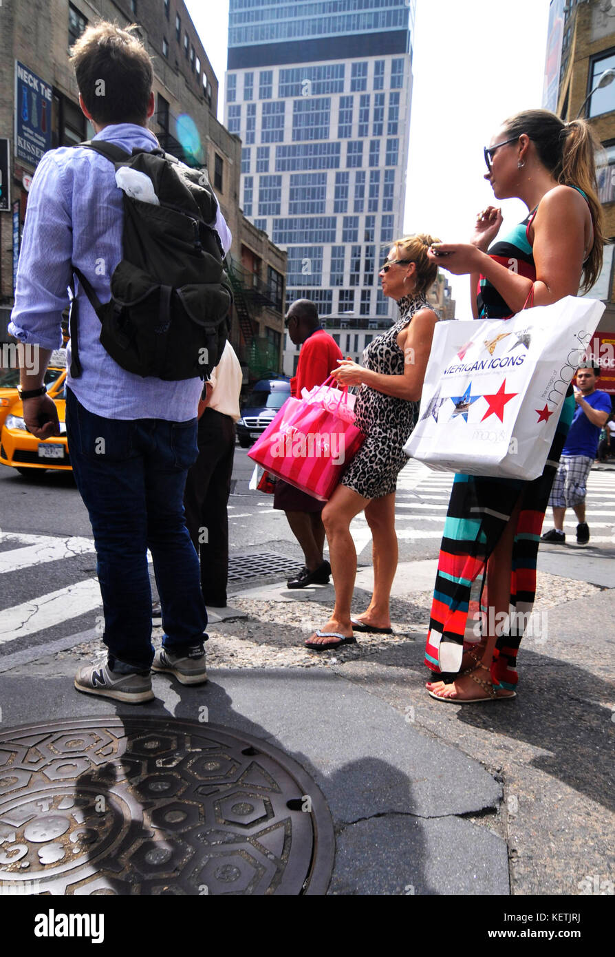 Fashionable women shopping in Manhattan. Stock Photo