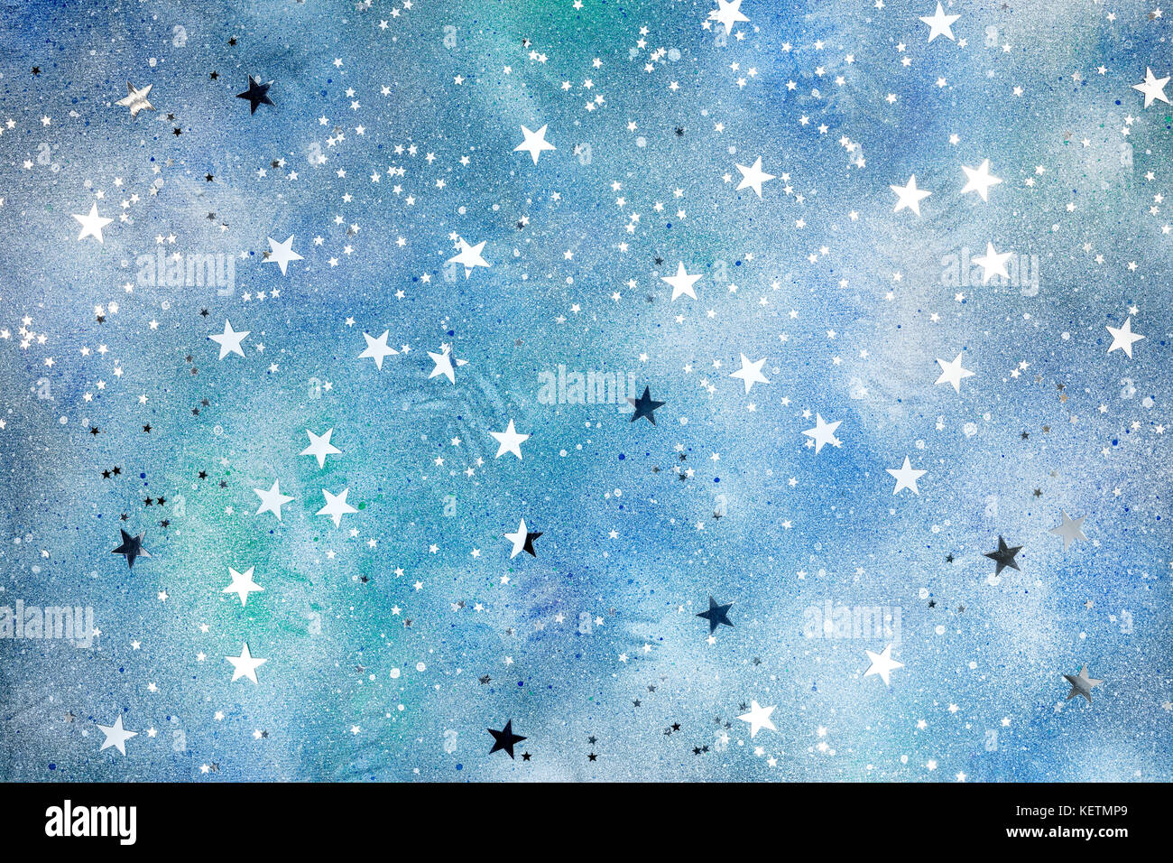 silver stars confetti ornament on blue decorative background with