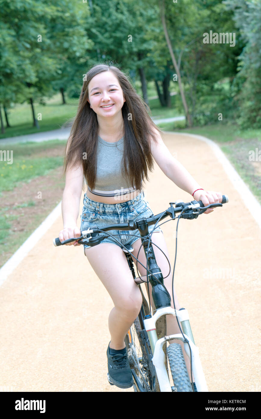 Girl teenager on a bicycle Stock Photo