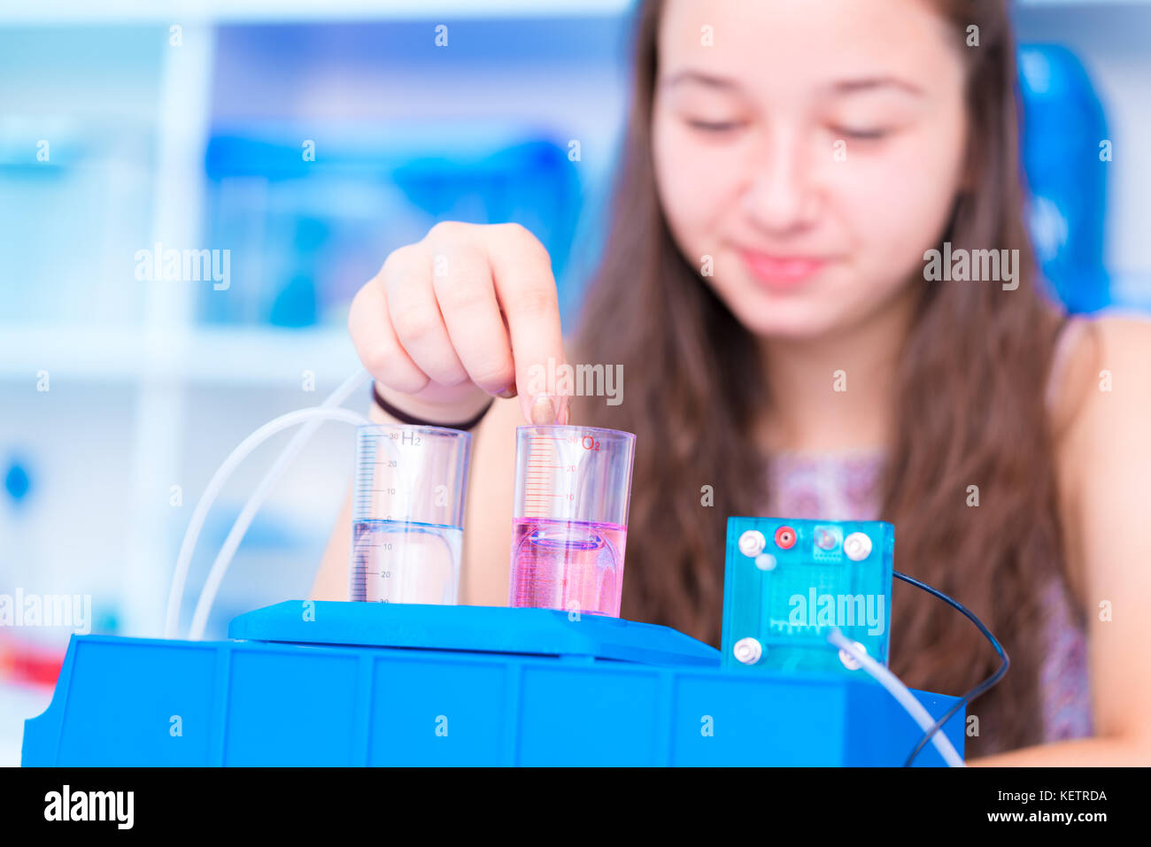 schoolgirl is experimenting with a hydrogen fuel cell Stock Photo Alamy