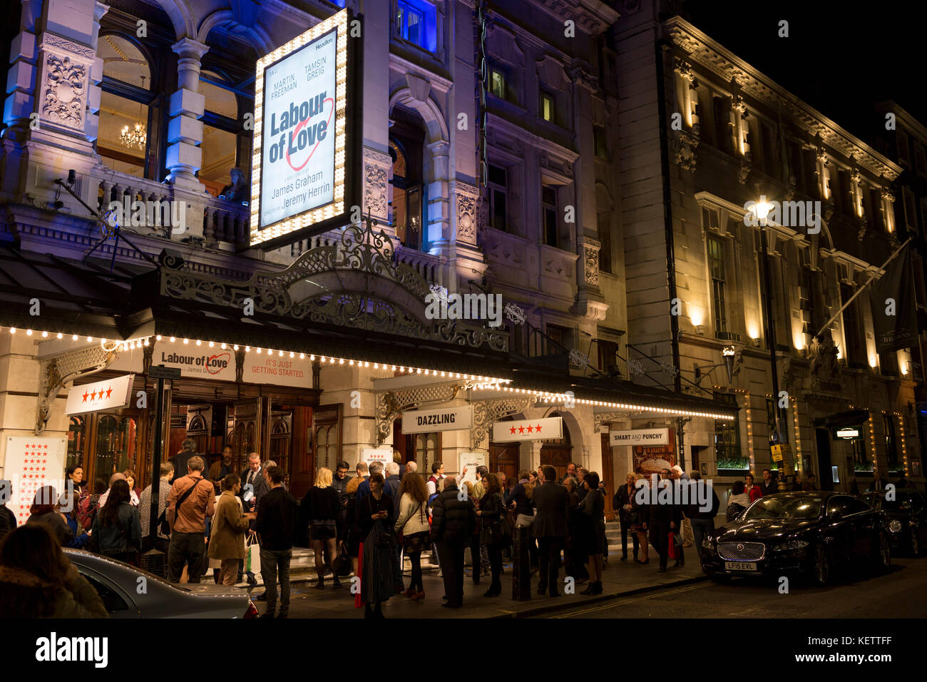 Theatre-goers outside the Noel Coward Theatre in St. Martin's Lane queue to see Labour of Love, a political comedy by James Graham and starring Martin Freeman and Tamsin Greig, on 16th October 2017, in London, England. Stock Photo