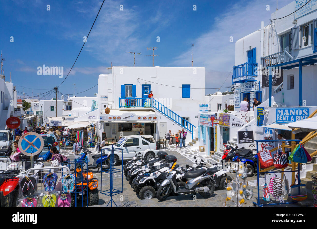 Souvenir shops and motorbike rental at Mykonos-town, Mykonos, Greece Stock Photo