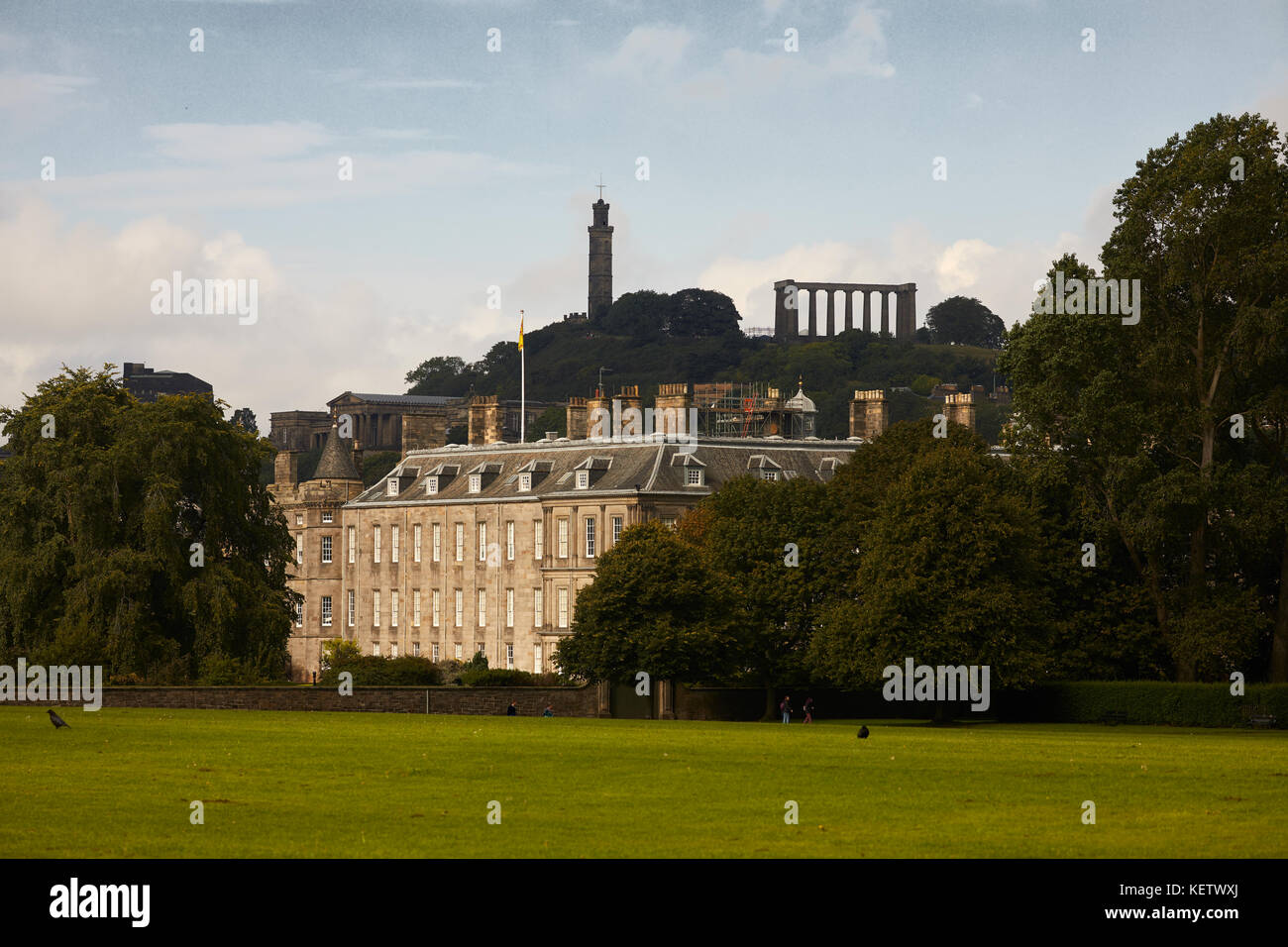 Historic Holyrood Park  Edinburgh, Scotland, Palace of Holyroodhouse, commonly  Holyrood Palace with Calton Hill behind on the skyline Stock Photo