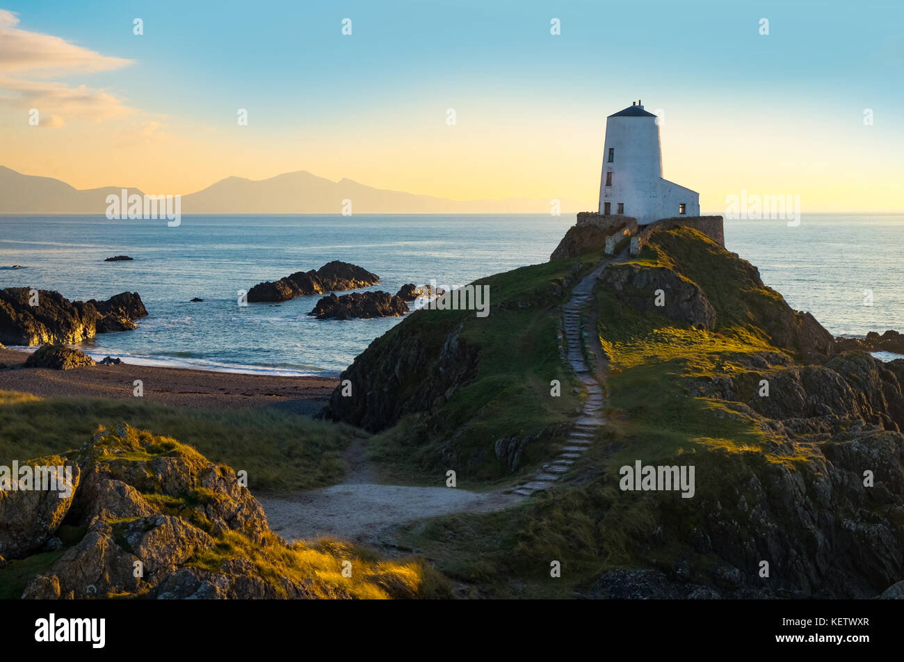 LLanddwyn headland and lighthouse on Anglesey Stock Photo