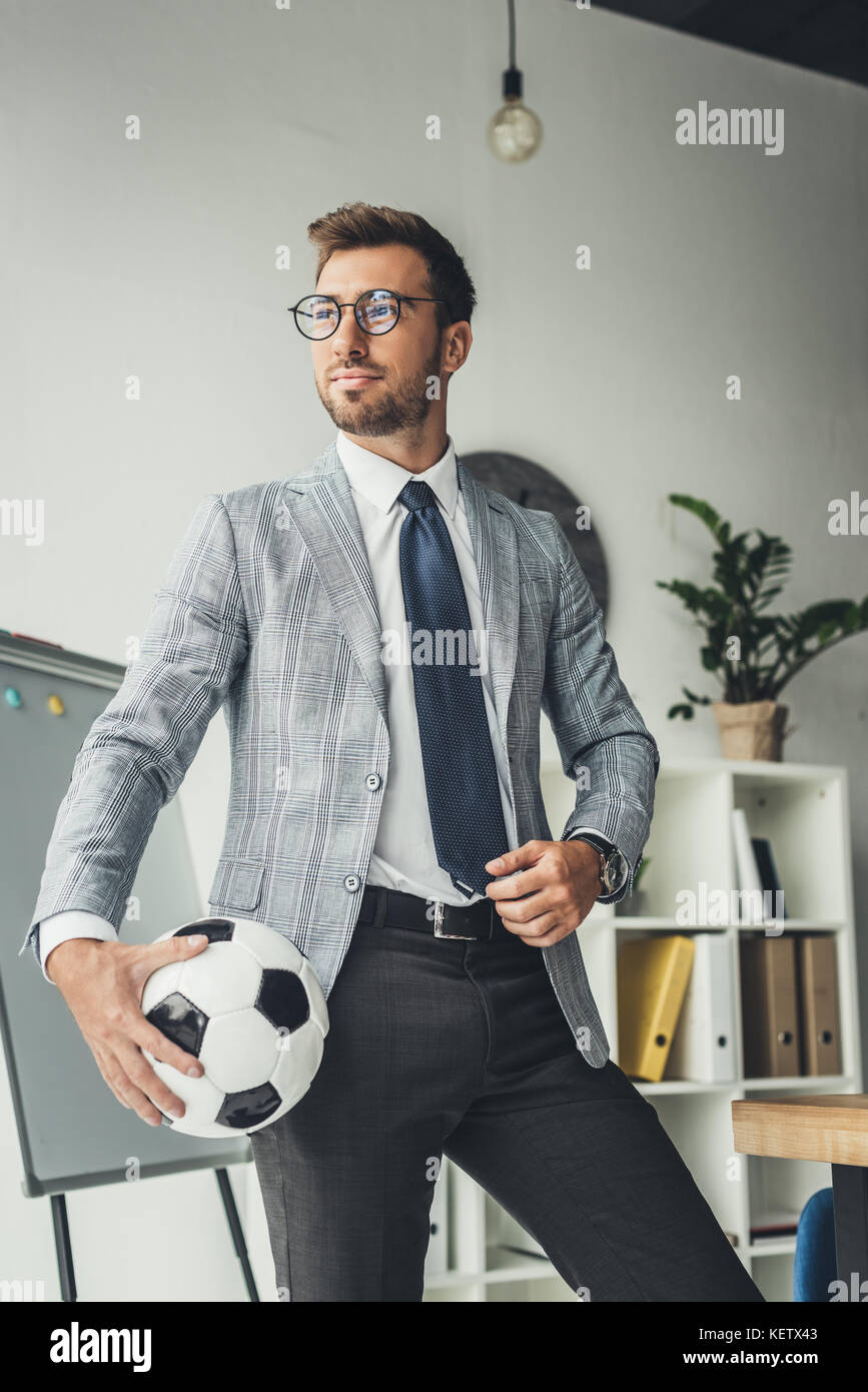 businessman with soccer ball Stock Photo - Alamy
