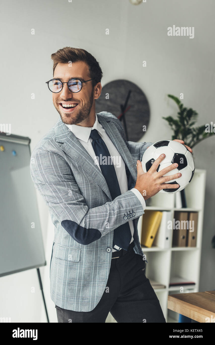 businessman with soccer ball Stock Photo - Alamy