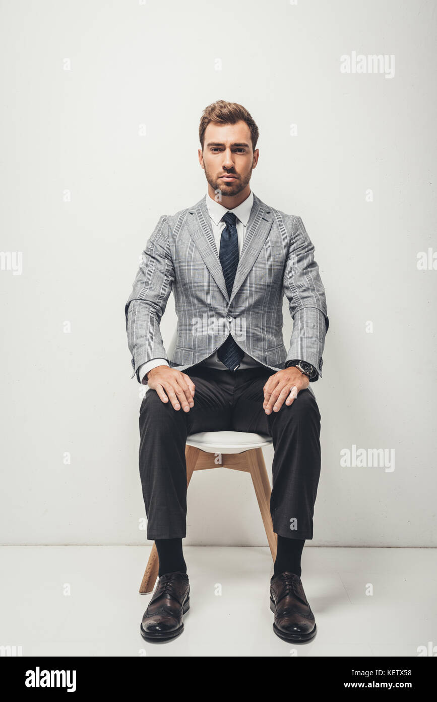 businessman sitting on chair Stock Photo