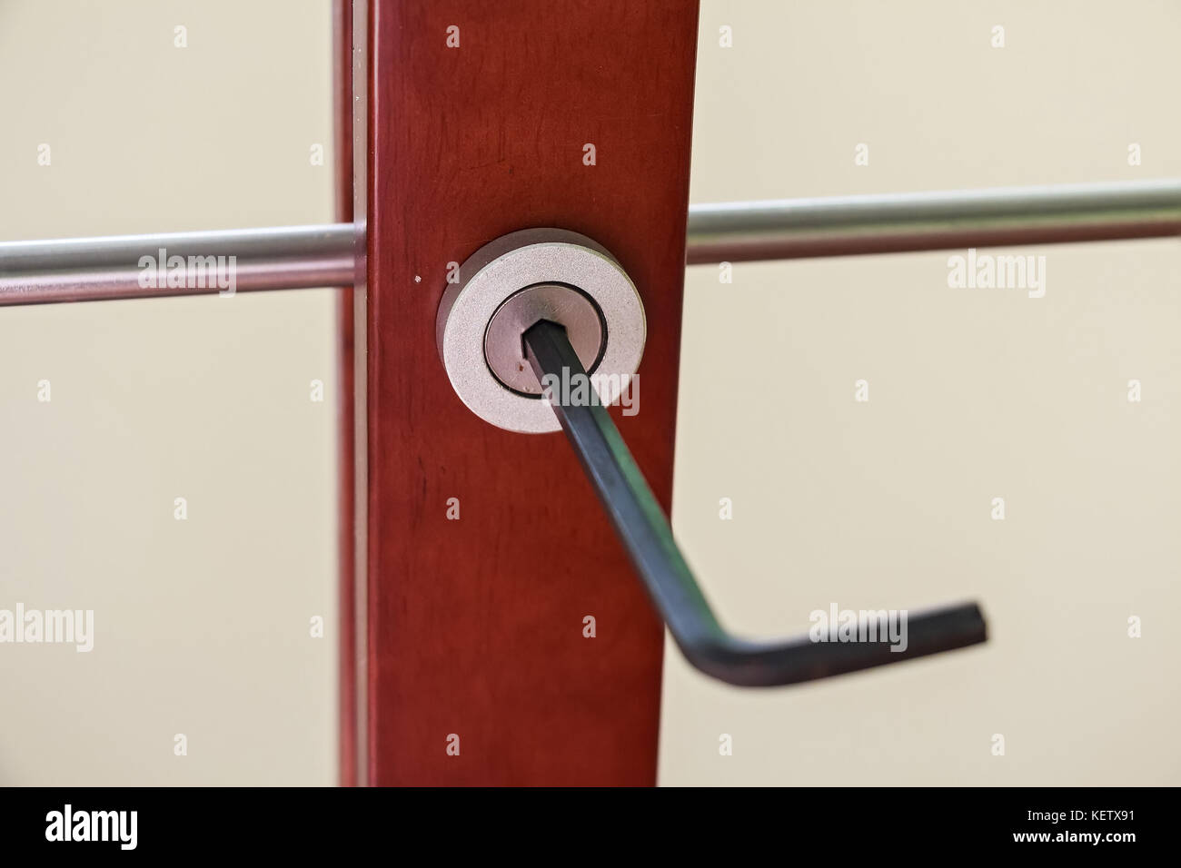 Assembling furniture with hex key Stock Photo Alamy