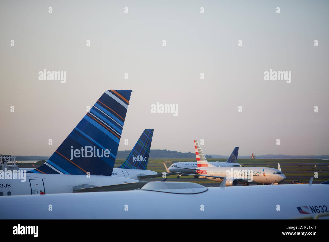 Boston Massachusetts New England North America USA , Jet blue and American Airlines at Logan International Airport terminal c Stock Photo