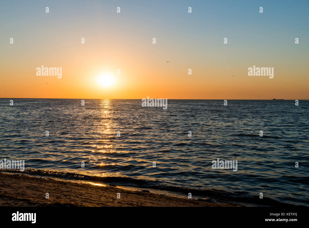Beautiful sunset over sea Stock Photo - Alamy