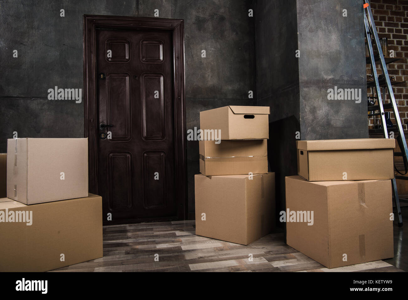 cardboard boxes in room Stock Photo Alamy