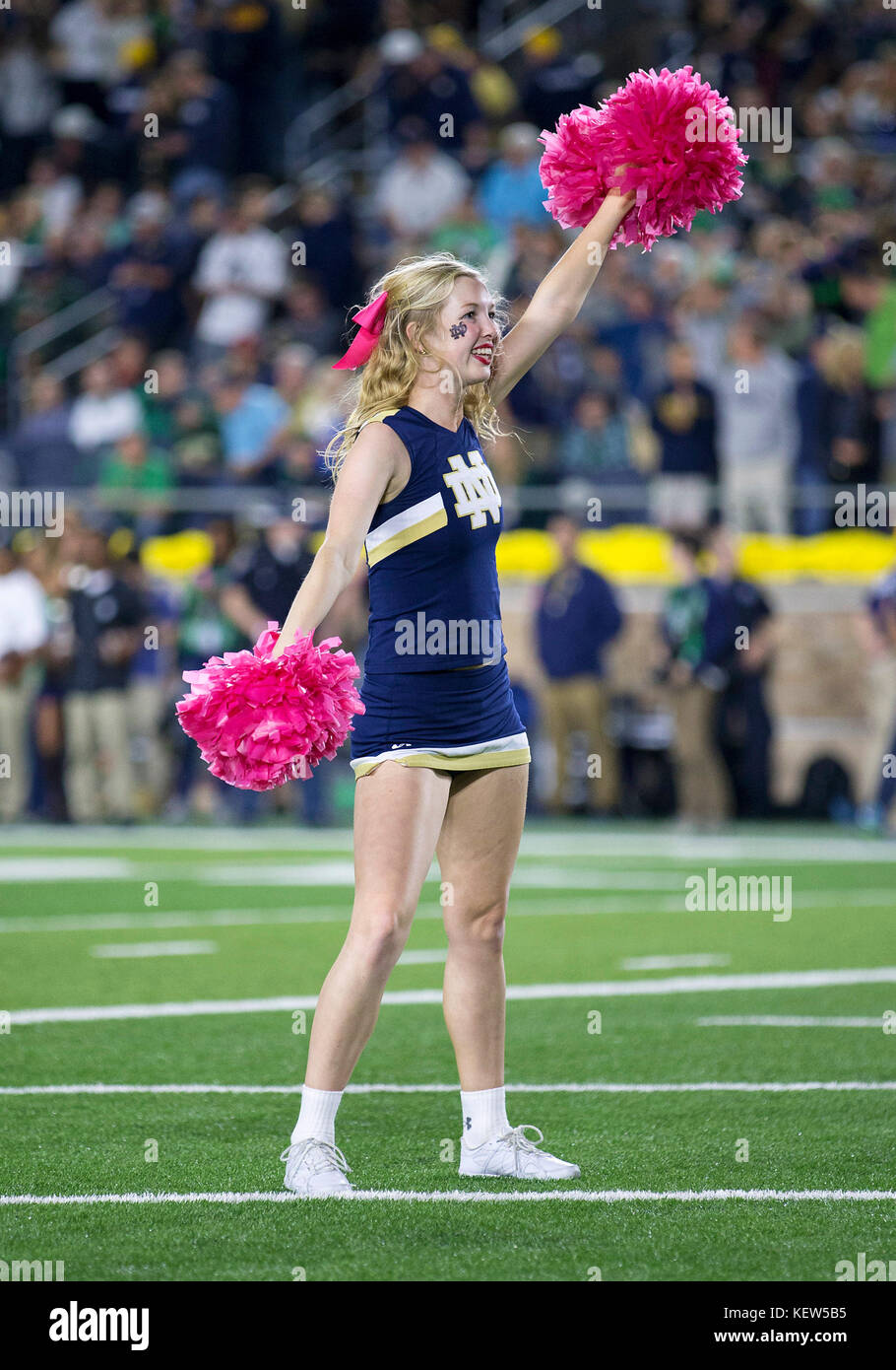 South Bend, Indiana, USA. 21st Oct, 2017. Notre Dame cheerleader performs during NCAA football game action between the USC Trojans and the Notre Dame Fighting Irish at Notre Dame Stadium in South Bend, Indiana. Notre Dame defeated USC 49-14. John Mersits/CSM/Alamy Live News Stock Photo