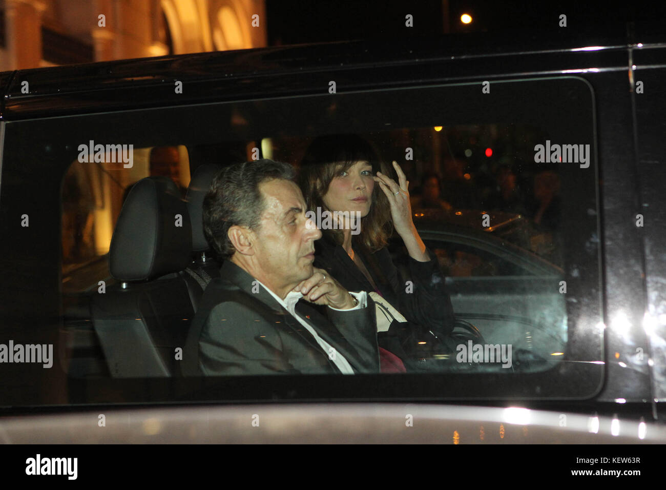 Athens, Greece. 23rd Oct, 2017. Former French President NICOLAS SARKOZY with his wife CARLA BRUNI leave from the Hotel for her first concert in Athens. The former french president with his wife Carla Bruni arrive in Athens for her world music tour, giving two performances at the iconic Pallas Theatre in Syntagma. ''French Touch'' is the title of Bruni's new album (to be released in October) and contains a collection of adaptations of well-known songs in English produced by the legendary producer, composer and musician David Foster. Credit: Aristidis Vafeiadakis/ZUMA Wire/Alamy Live News Stock Photo
