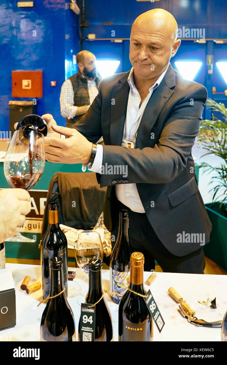 Madrid, Spain. 23rd Oct, 2017. Annual show of the best Spanish wines organized by the Penin Guide, Guía Peñín. The event, which will take place on 23 and 24 October at Pavilion 2 of IFEMA, Madrid. The wineries exhibit their best wines valued by the Guide. Only wines valued from 90 to 99 points are shown. A great opportunity to test the most outstanding of the Spanish oenological sector. Photo: M.Ramirez/Alamy Live News Stock Photo