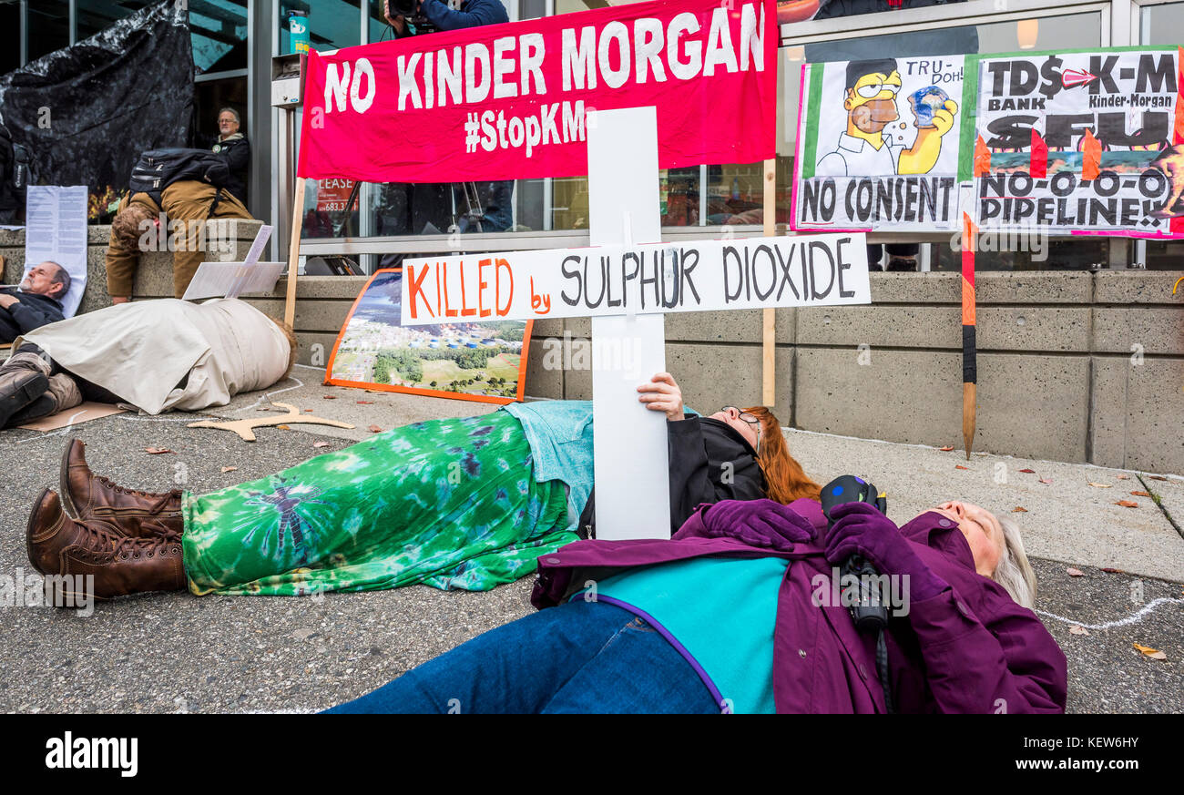 Burnaby, Canada. 23rd Oct, 2017. Kinder Morgan Die-in, outside Public Safety Canada office, Burnaby, British Columbia, Canada Credit: Michael Wheatley/Alamy Live News Stock Photo