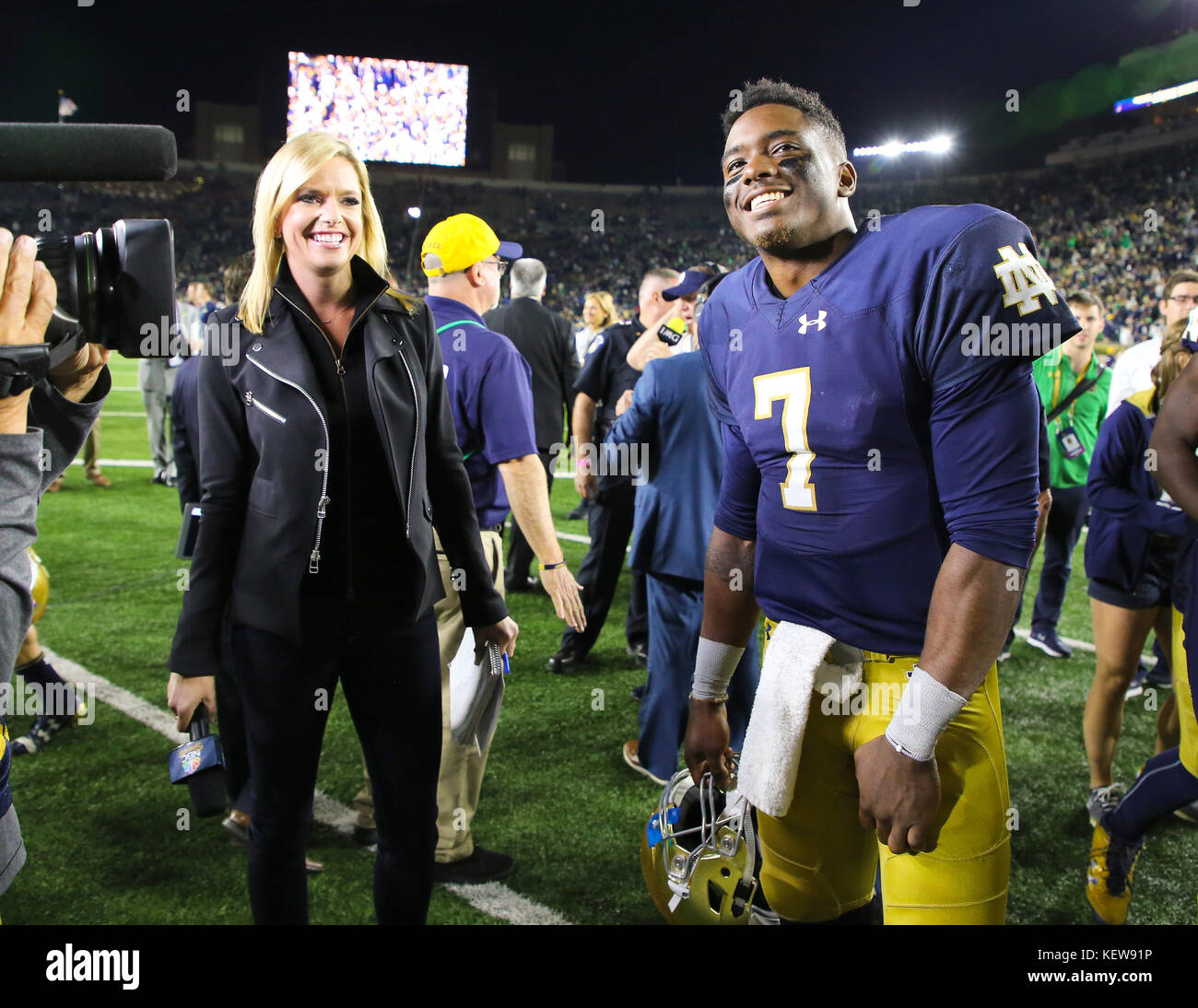 NBC sideline reporter Kathryn Tappen laughs before interviewing Notre