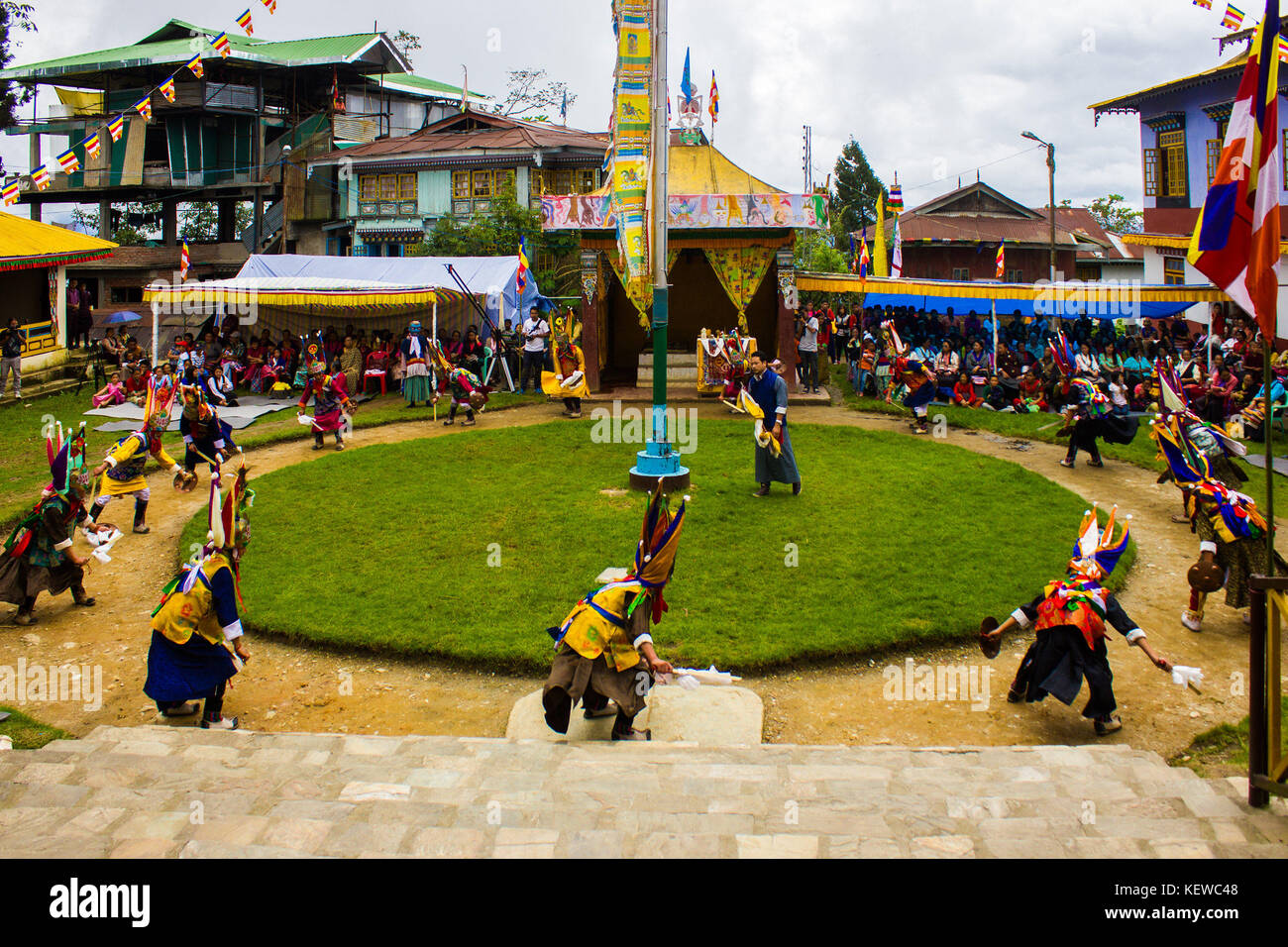 August 29, 2015 - Friendship, harmony, a lofty mountain and a wrathful deity ''” these are the four things that Pang Lhabsol, an annual festival in Sikkim, is about. The peaceful hill-state was once torn apart by strife and enmity between the Lepchas and the Bhutias (of Tibetan origin). Locals believe that Pang Lhabsol was first celebrated sometime in the 13th century to mark the beginning of peaceful relations between the warring groups. Lepcha chief Thekongtek and Tibetan crown prince Khya Bumsa erected nine slabs at Kabilunchok (near Gangtok, the current capital), tied animal intestines aro Stock Photo