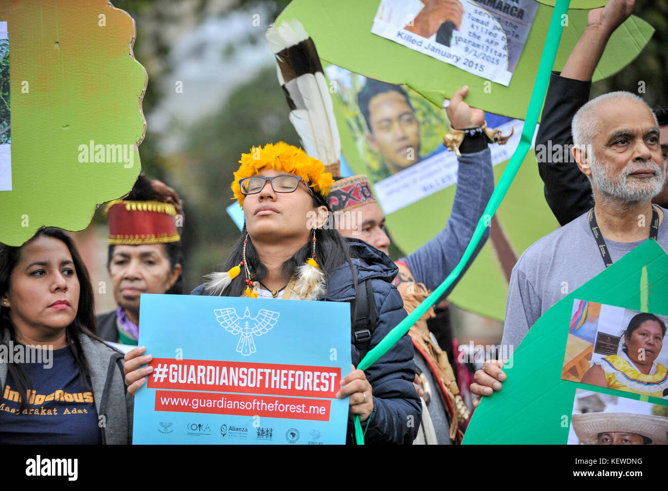 London, UK.  24 October 2017.  Indigenous people from South America and Asia take part in a demonstration in Parliament Square as part of the Guardians of the Forest campaign.  They call for land rights, access to climate finance and inclusion of ancestral knowledge in climate strategies ahead of climate talks taking place in Bonn, Germany in November. Credit: Stephen Chung / Alamy Live News Stock Photo