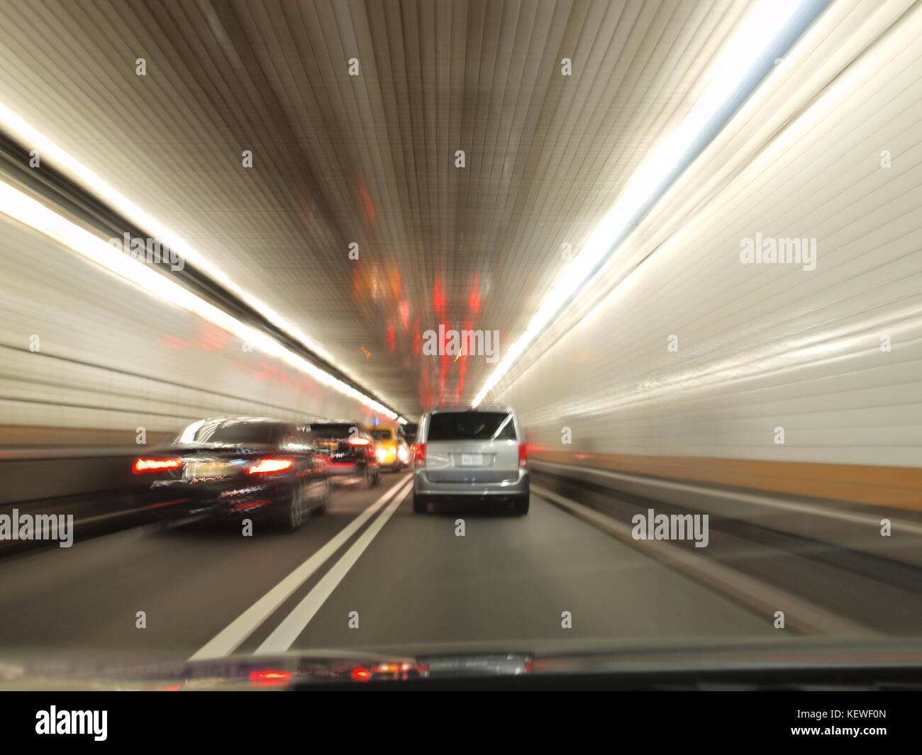 Escaping Manhattan in the Lincoln Tunnel to New Jersey. Stock Photo