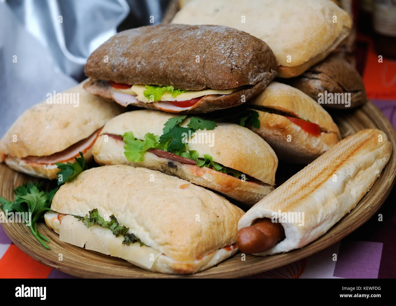 Popular Italian panini sandwich with ham on wooden background Stock Photo