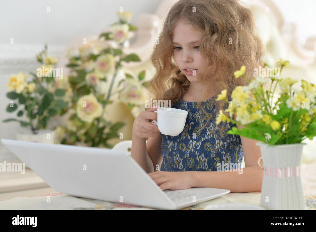 little girl using laptop Stock Photo - Alamy
