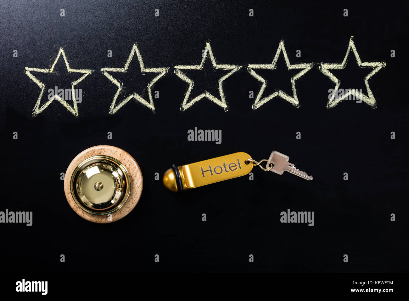 Five Star Service Concept  With Service Bell And Hotel Key On Blackboard Stock Photo