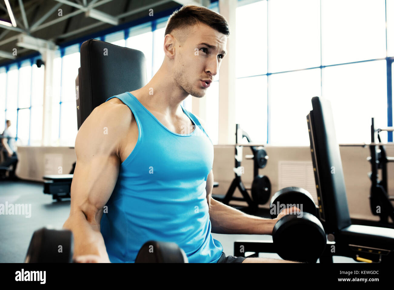 Strong Man Working Out in Gym Stock Photo