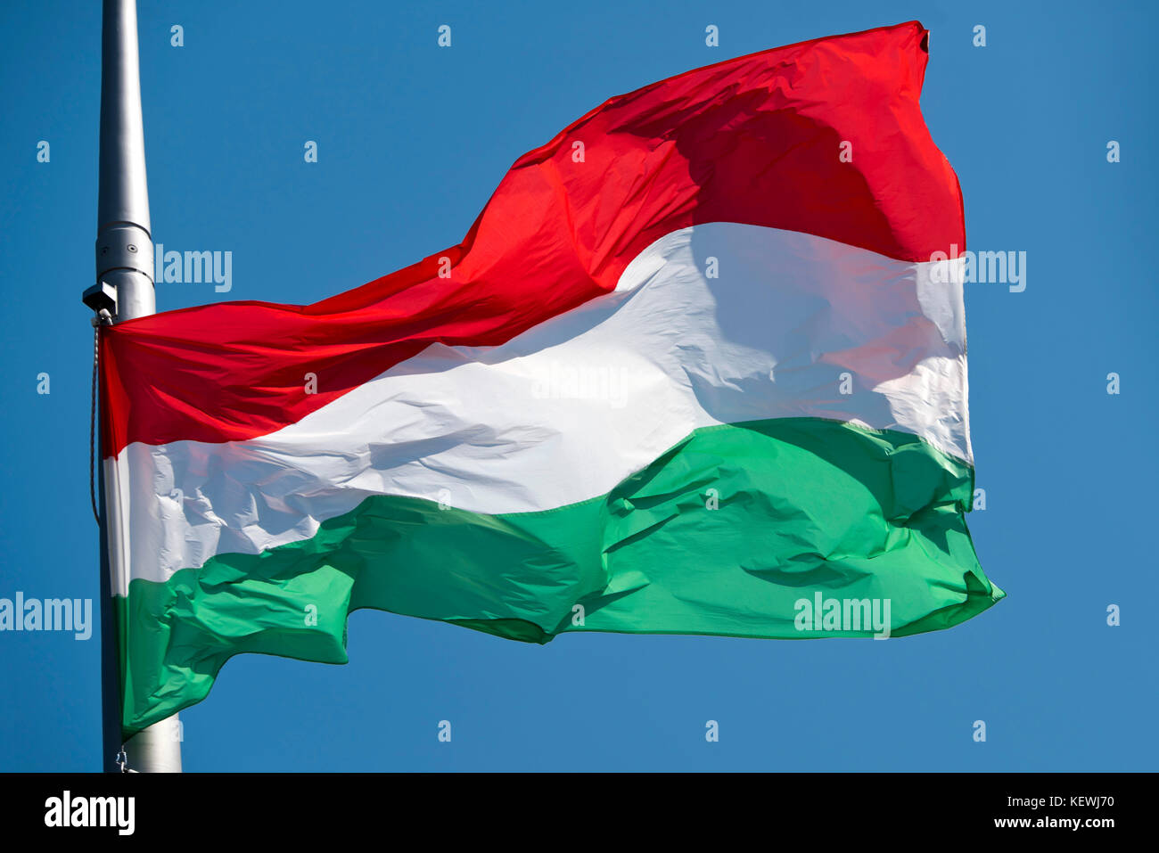 Horizontal close up view of the official Hungarian flag. Stock Photo