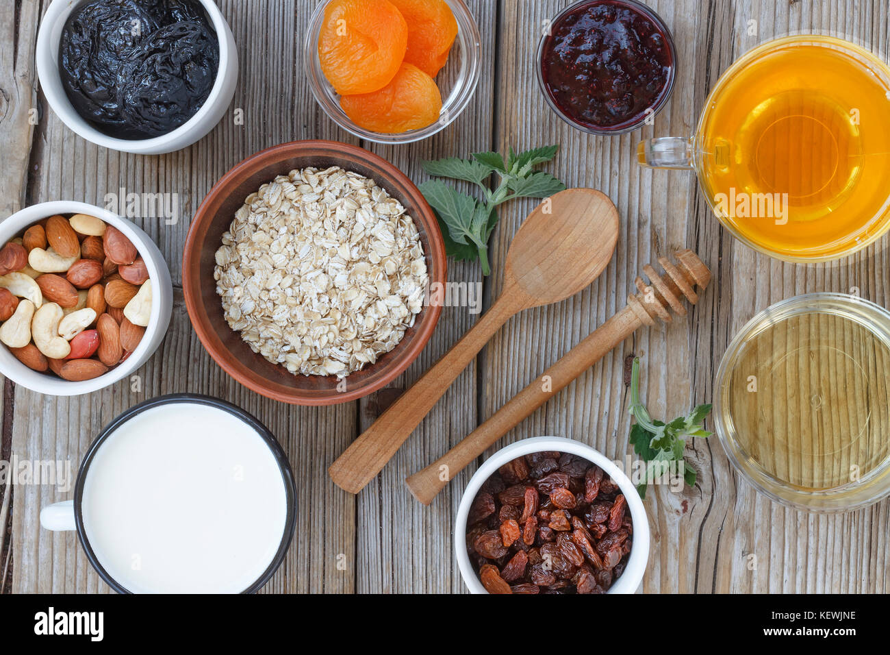 Oat flakes, dried fruits and yogurt, nuts and honey. Concept proper
