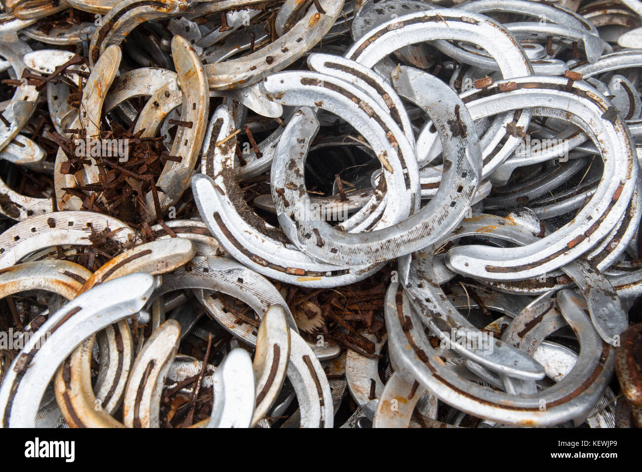A stack of used horse shoes Stock Photo Alamy