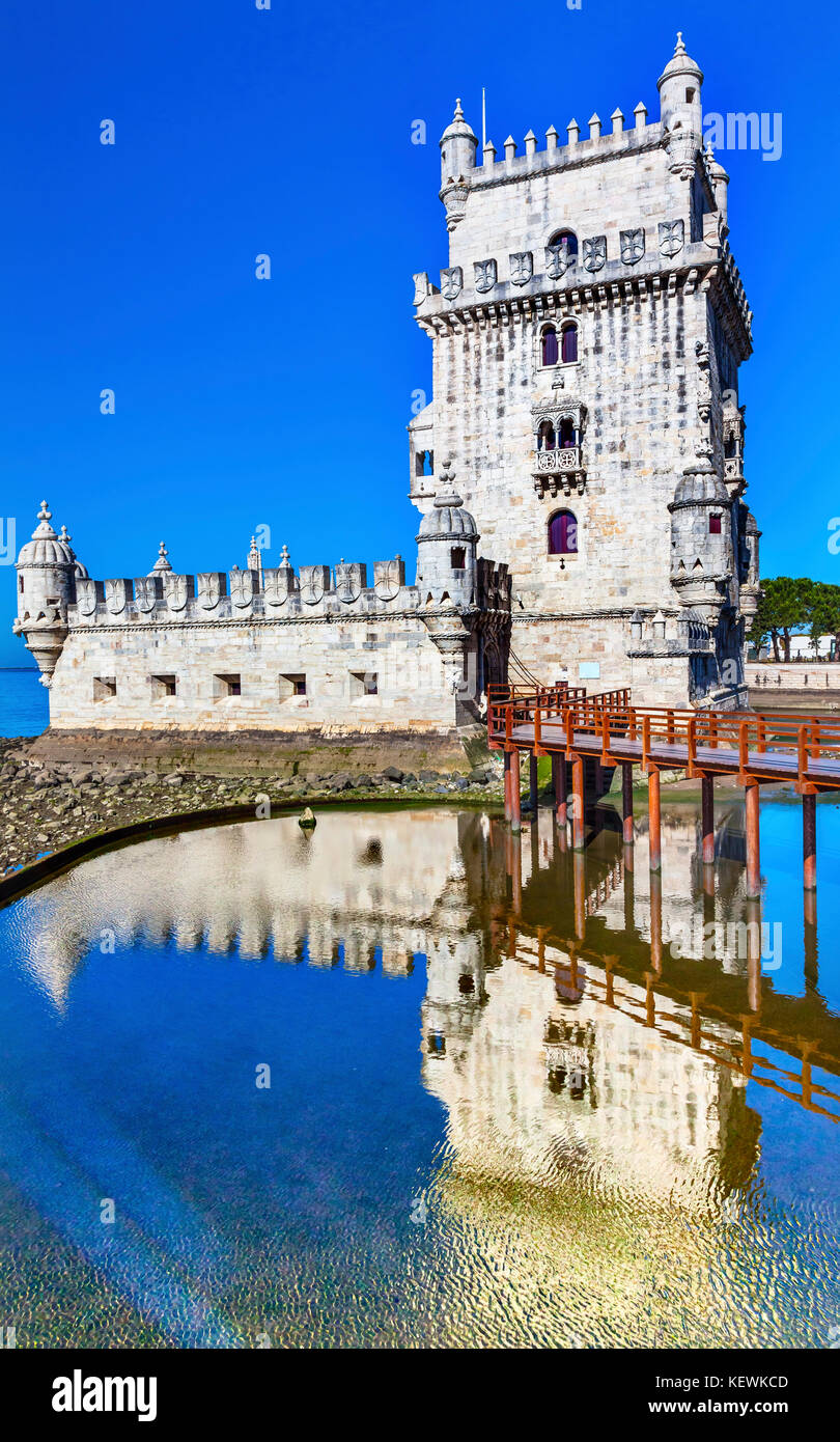 Belem Tower Torre de Belem Portuguese Symbol of Exploration Reflection Lisbon Portugal.  Belem Tower was constructed in early 1500s on Tagus River and Stock Photo