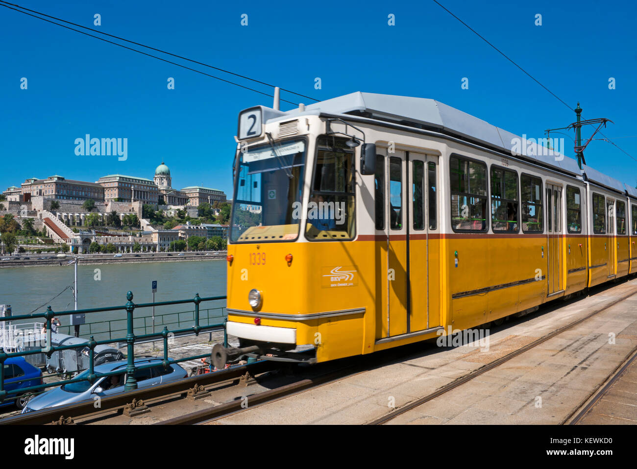 Horizontal view of a bright yellow tram in Budapest. Stock Photo