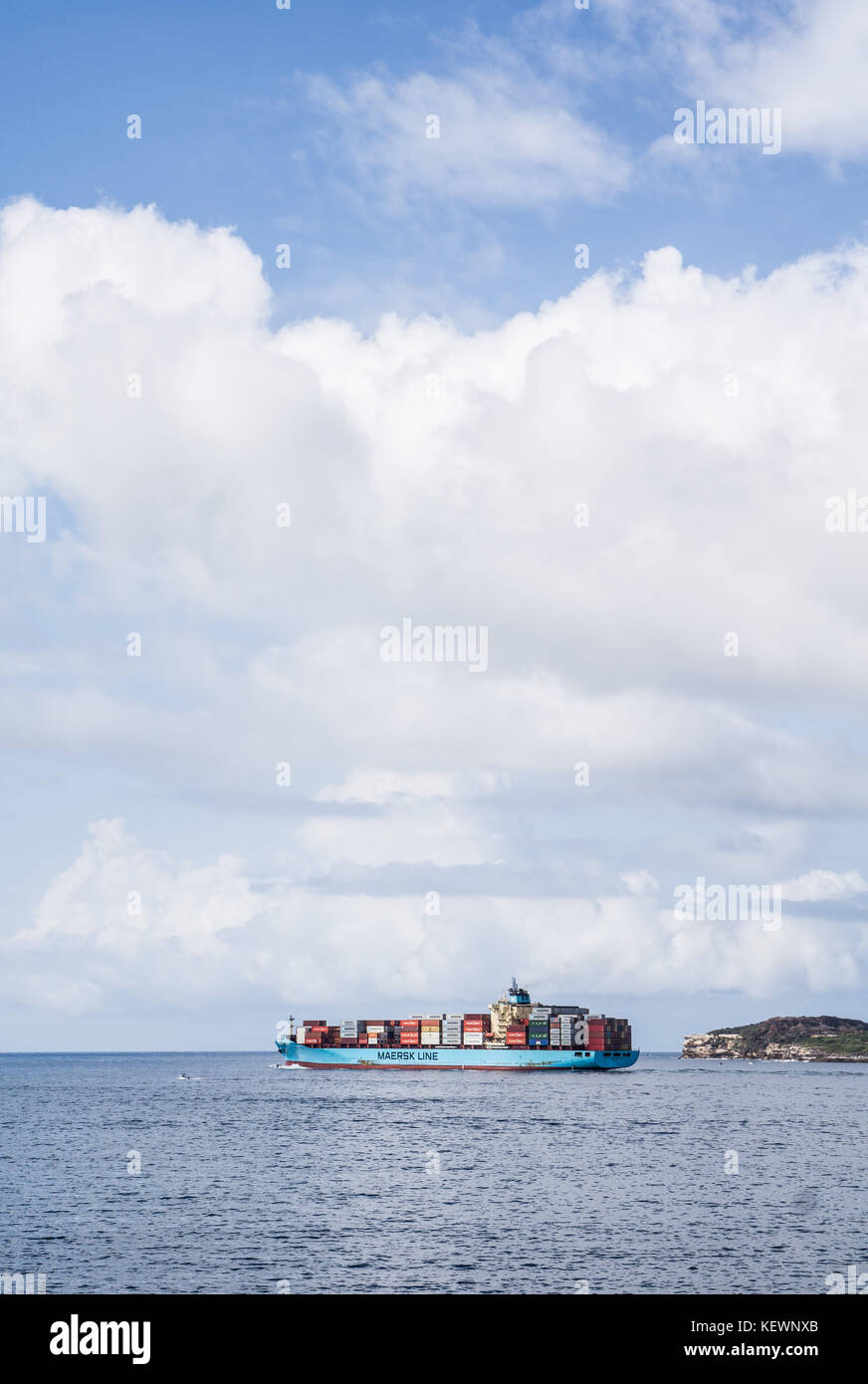 A container ship steams out of Botany Bay, Australia Stock Photo