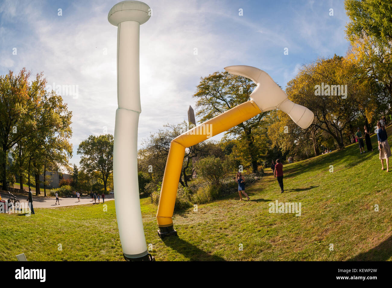 Daniele Frazier's 'It Takes Two (Hammer and Nail)' 2015 at 'It's Happening'. Reminiscent of a 1960's 'happening' the Public Art fund brought performance, sculptures and other artists to Central Park for 'It's Happening!' on Saturday, October 21, 2017. Thousands of visitors came to Central Park's East Pinetum to experience performance art, sculpture and to get their hands dirty creating their own artworks.  (© Richard B. Levine) Stock Photo