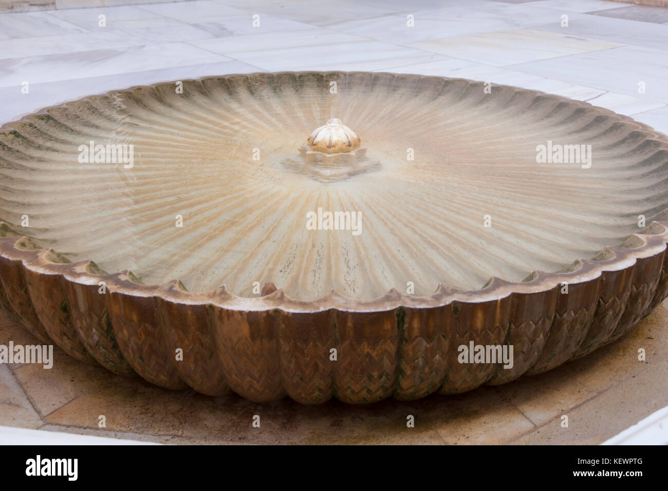 Granada, Spain: The Alhambra Palace and Fortress. Dry fountain in the Cuarto Dorado (Patio of the Gilded Room) in the Palacio Nazaríes. Stock Photo