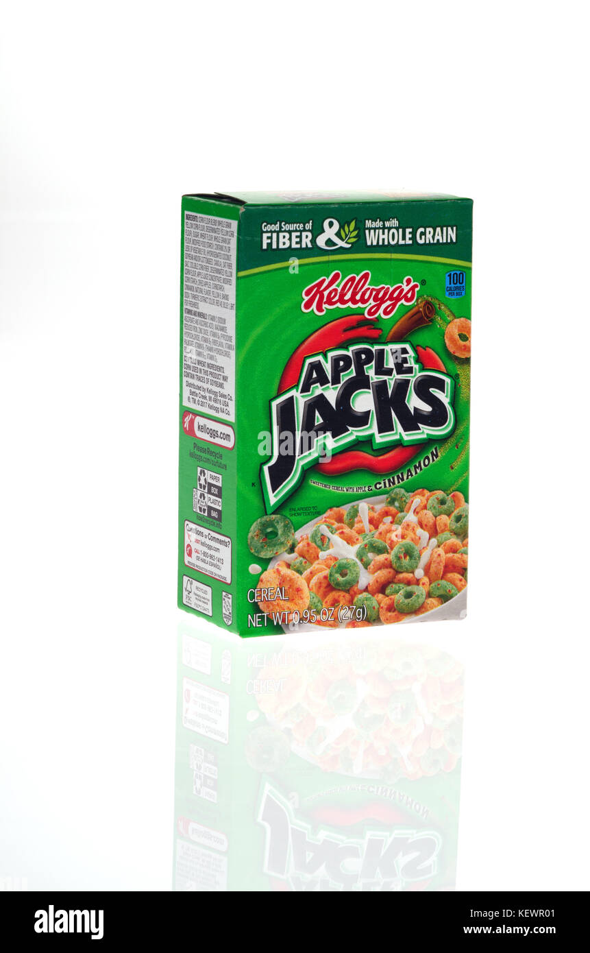 Unopened box of Kelloggs breakfast cereal Apple Jacks on white background, cut out USA Stock Photo