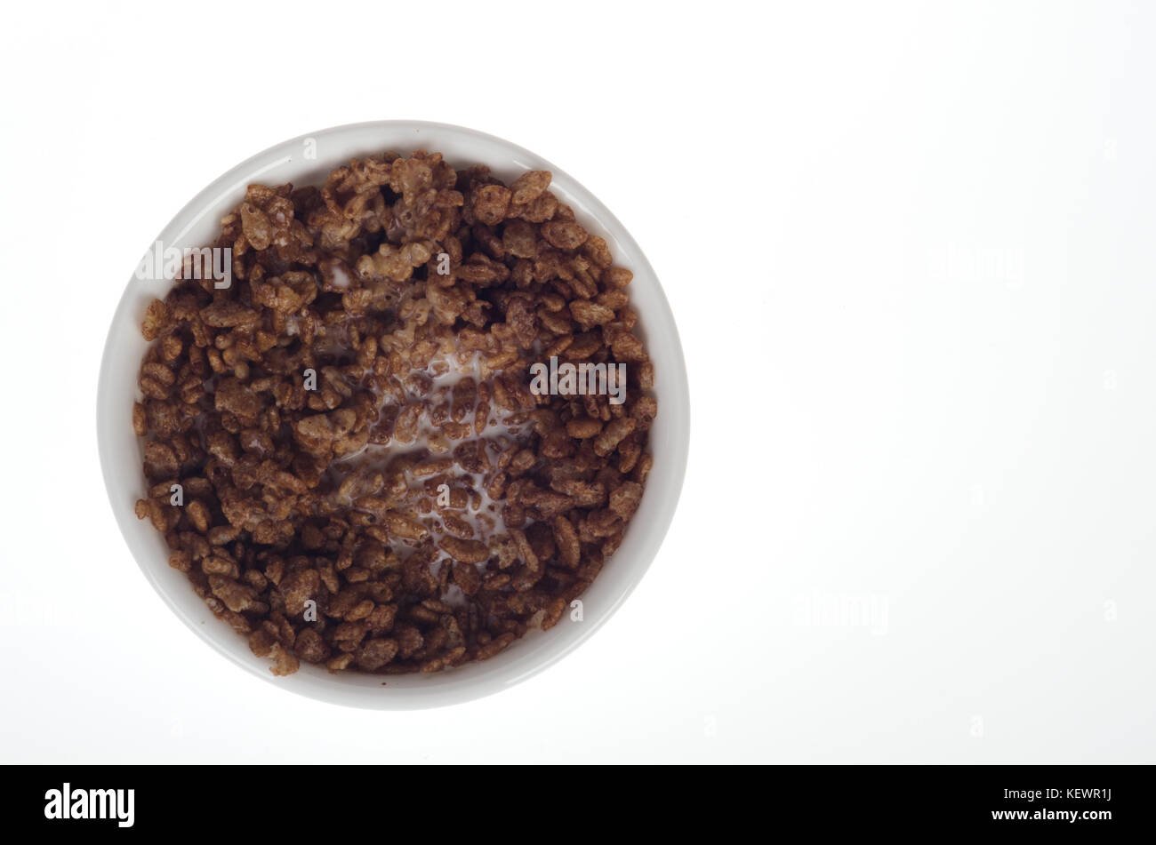 Bowl of Kellogg's Cocoa Krispies breakfast cereal with milk from above USA Stock Photo