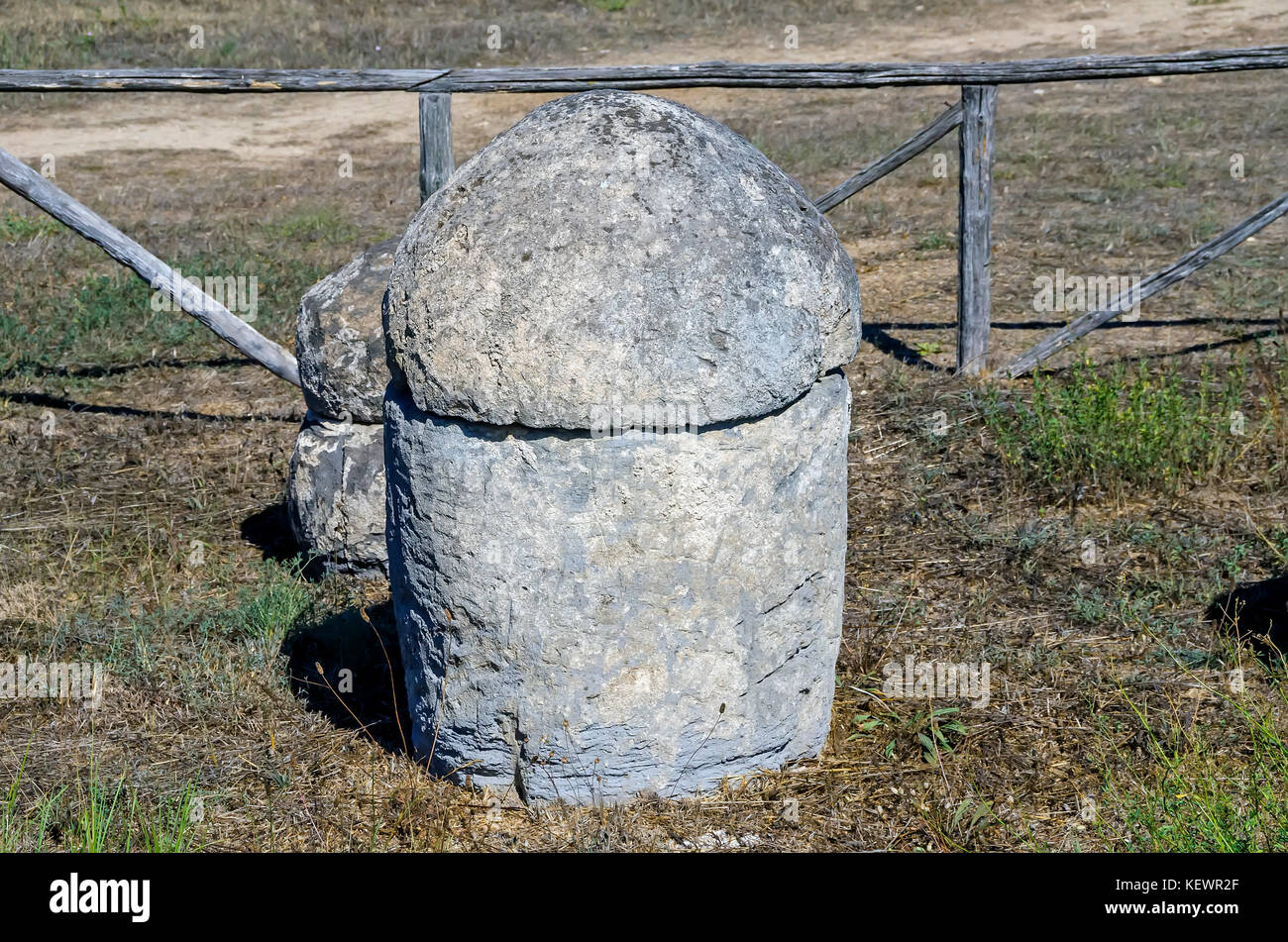 Round carved stone tombs for cremation burials at Tarquinia Necropolis, Tarquinia, Viterbo, Lazio, Italy. Stock Photo