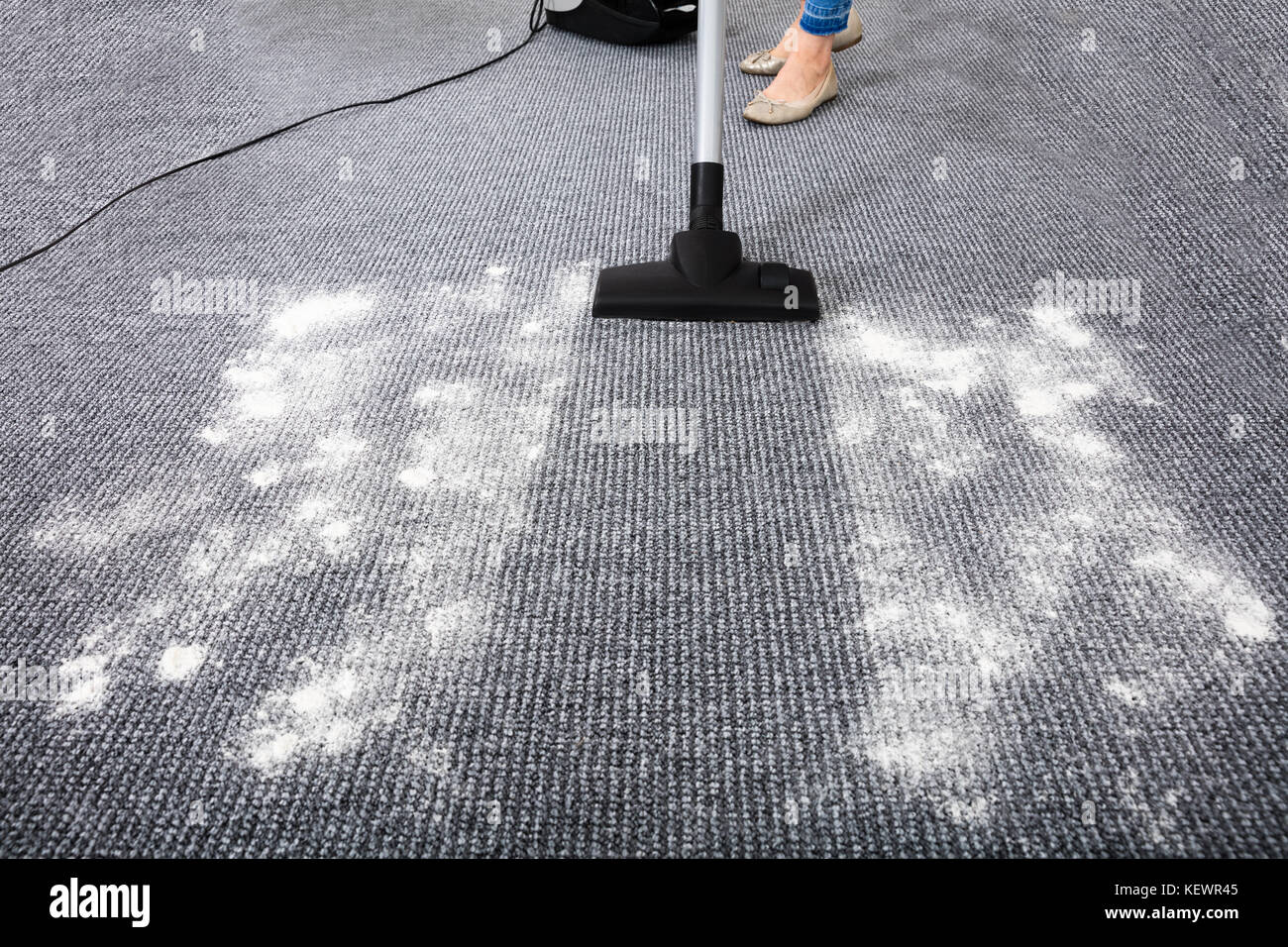 Closeup Of Vacuum Cleaner Cleaning Dirt On Carpet Stock Photo Alamy